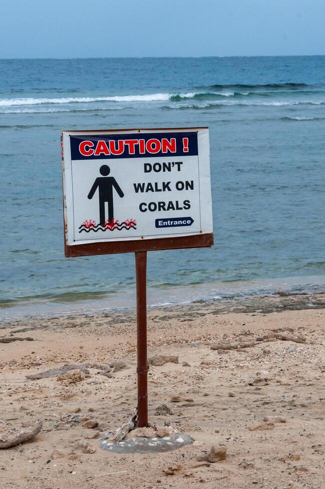 EGYPT, MARSA ALAM - FEBRUARY 27, 2019 information board about the danger of corals on the shores of the Red Sea in Marsa Alam, Egypt photo