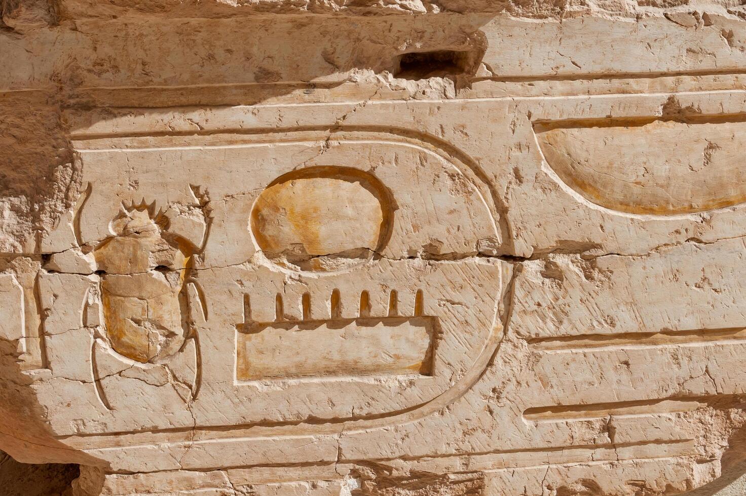 EGYPT, LUXOR - MARCH 01, 2019 archaeological site, drawings and geoglyphs on the walls of an ancient temple, the temple of Hatshepsut near Luxor in Egypt photo