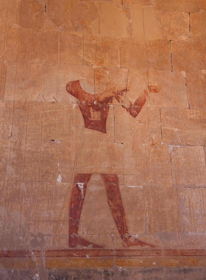 EGYPT, LUXOR - MARCH 01, 2019 archaeological site, drawings and geoglyphs on the walls of an ancient temple, the temple of Hatshepsut near Luxor in Egypt photo