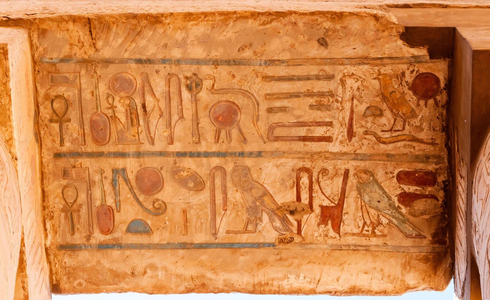 EGYPT, LUXOR - MARCH 01, 2019 ancient Egyptian hieroglyphs, drawings and inscriptions on the walls and columns in the temple of Karnak in Luxor photo