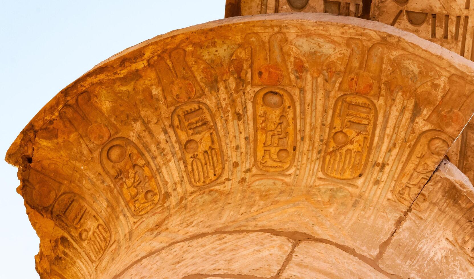 EGYPT, LUXOR - MARCH 01, 2019 ancient Egyptian hieroglyphs, drawings and inscriptions on the walls and columns in the temple of Karnak in Luxor photo