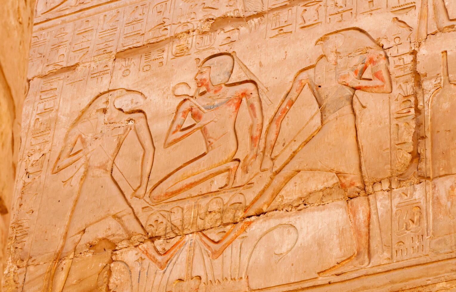 EGYPT, LUXOR - MARCH 01, 2019 ancient Egyptian hieroglyphs, drawings and inscriptions on the walls and columns in the temple of Karnak in Luxor photo