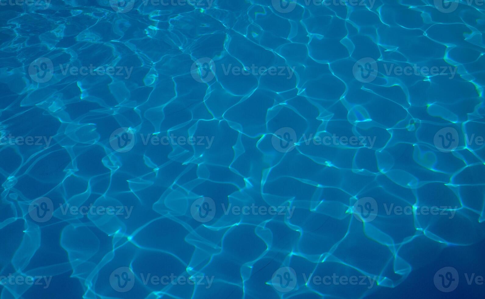 The reflection of the suns rays in the water in the pool with sea water, The glare of the sun, Egypt photo