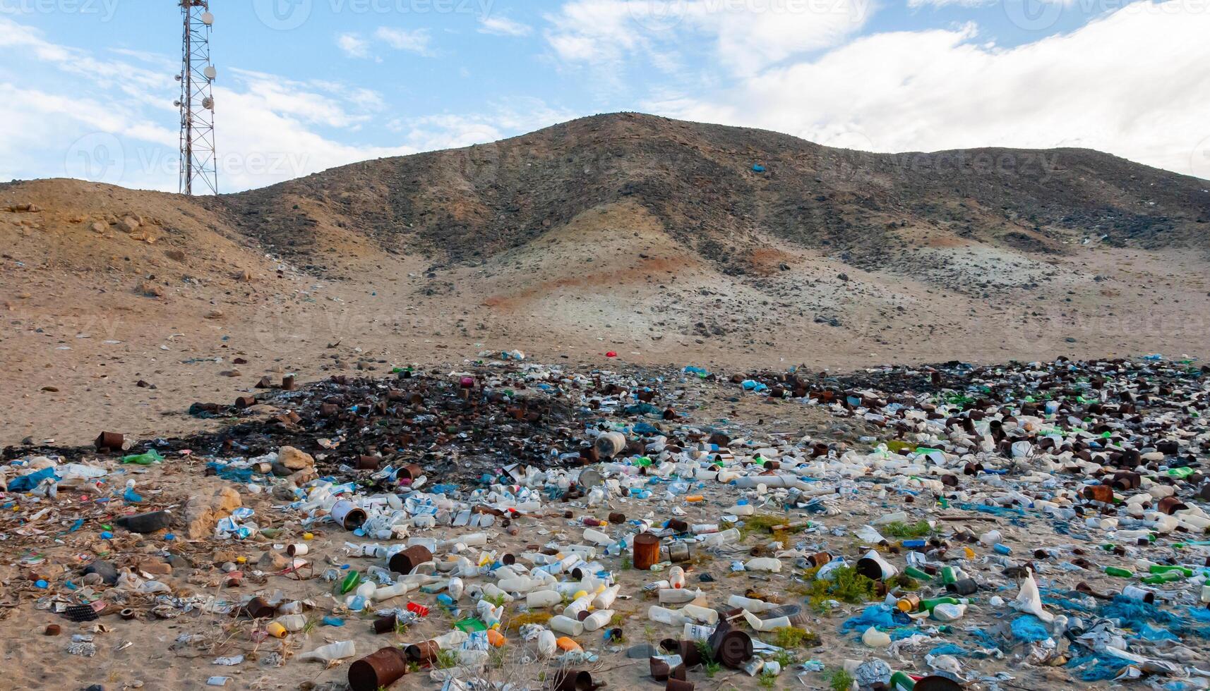 Plastic bottles and various garbage from hotels in the wild, Garbage dump in the desert in Egypt photo