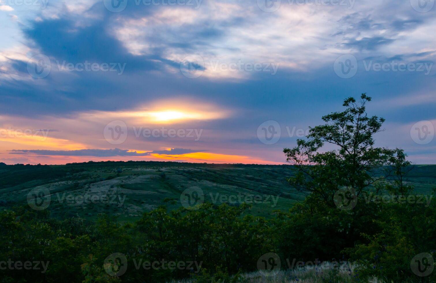 Orange sunset with clouds over the shore Tiligul Estuary, Ukraine photo