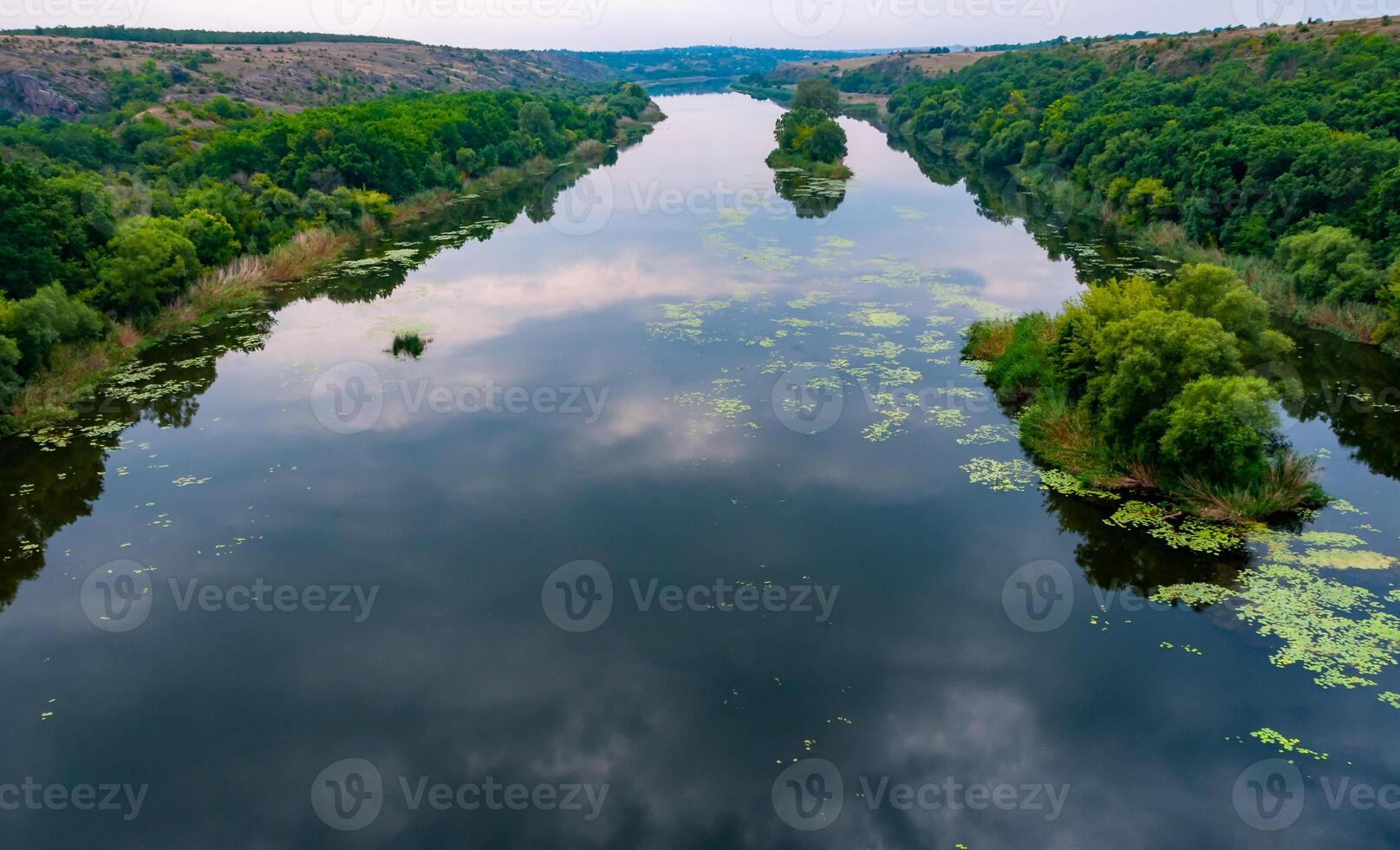 Old floodplain forest along the banks of the Southern Bug River in a granite canyon photo