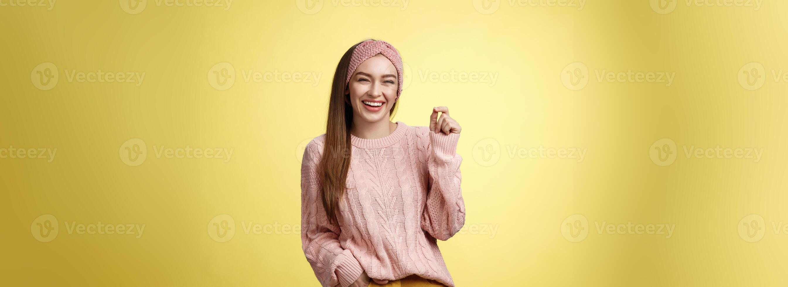 Happy carefree pleasant cute young 20s european girlfriend laughing joyfully, smiling having fun feeling positive, entertained, snap fingers gets what she wants, amused how easily dreams come true photo