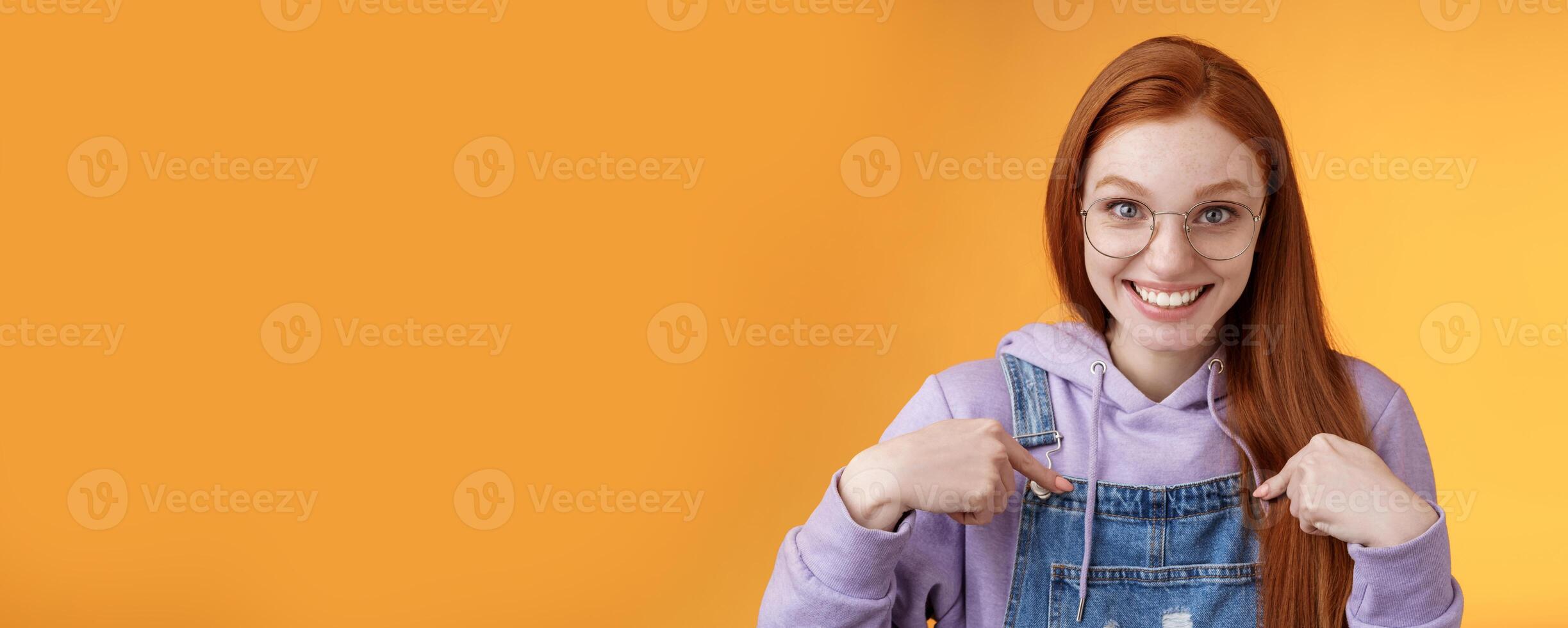 Surprised happy pleased happy smiling young redhead girl getting awesome proposal grinning questioned pointing herself laughing full disbelief receive promotion unbelievable chance photo