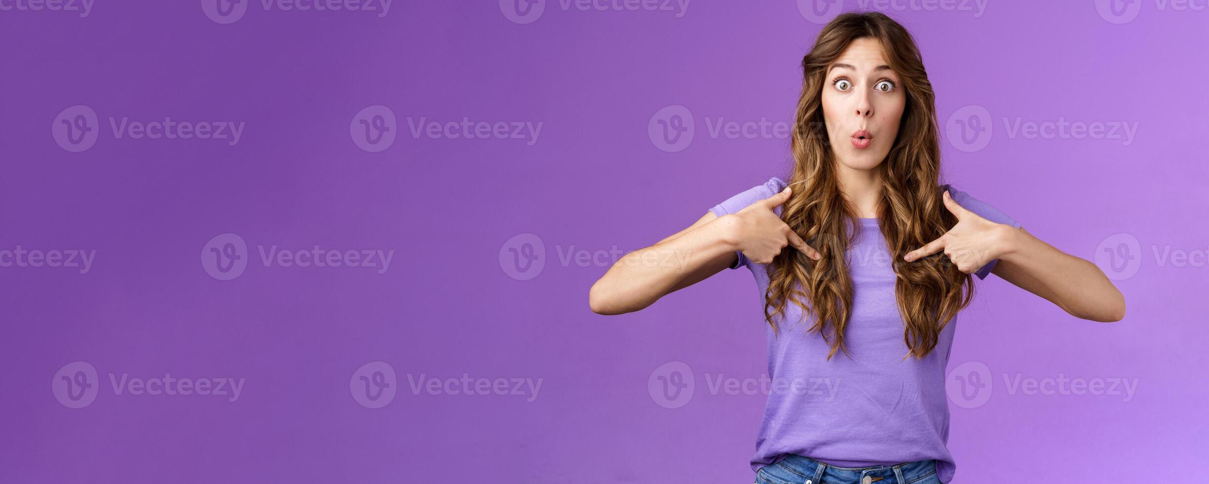 You mean me. Surprised cheerful silly caucasian female student pointing herself impressed astonished choice was picked chosen folding lips excitement, receive awesome unexpected gift photo