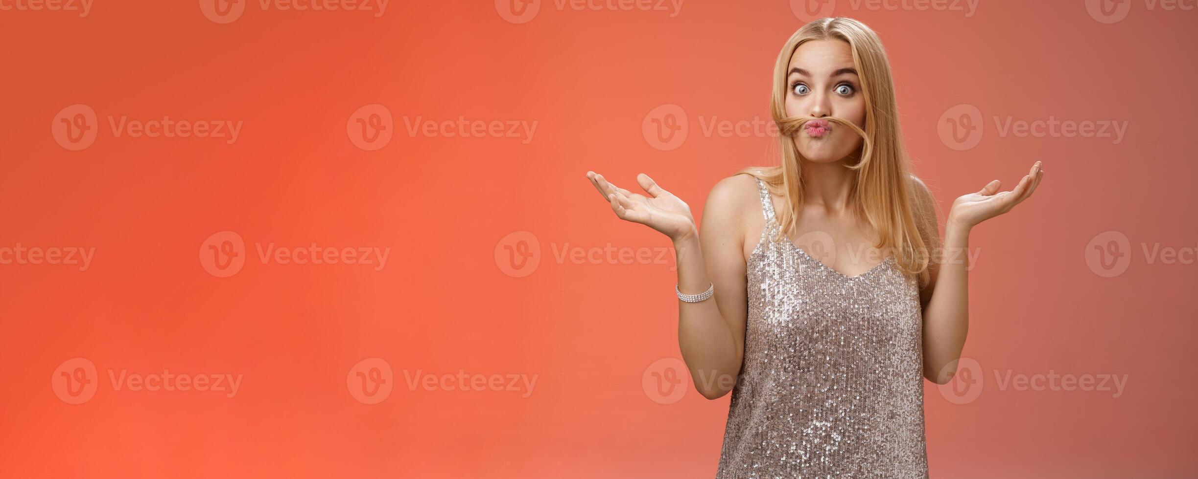 Who told I adult. Playful carefree funny charming blond woman make moustache from hair strand mimicking old man shrugging hands sideways questioned fool around playing red background photo