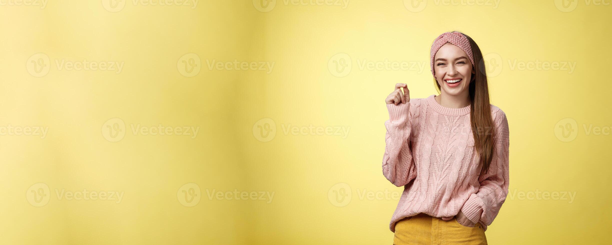 Happy carefree pleasant cute young 20s european girlfriend laughing joyfully, smiling having fun feeling positive, entertained, snap fingers gets what she wants, amused how easily dreams come true photo