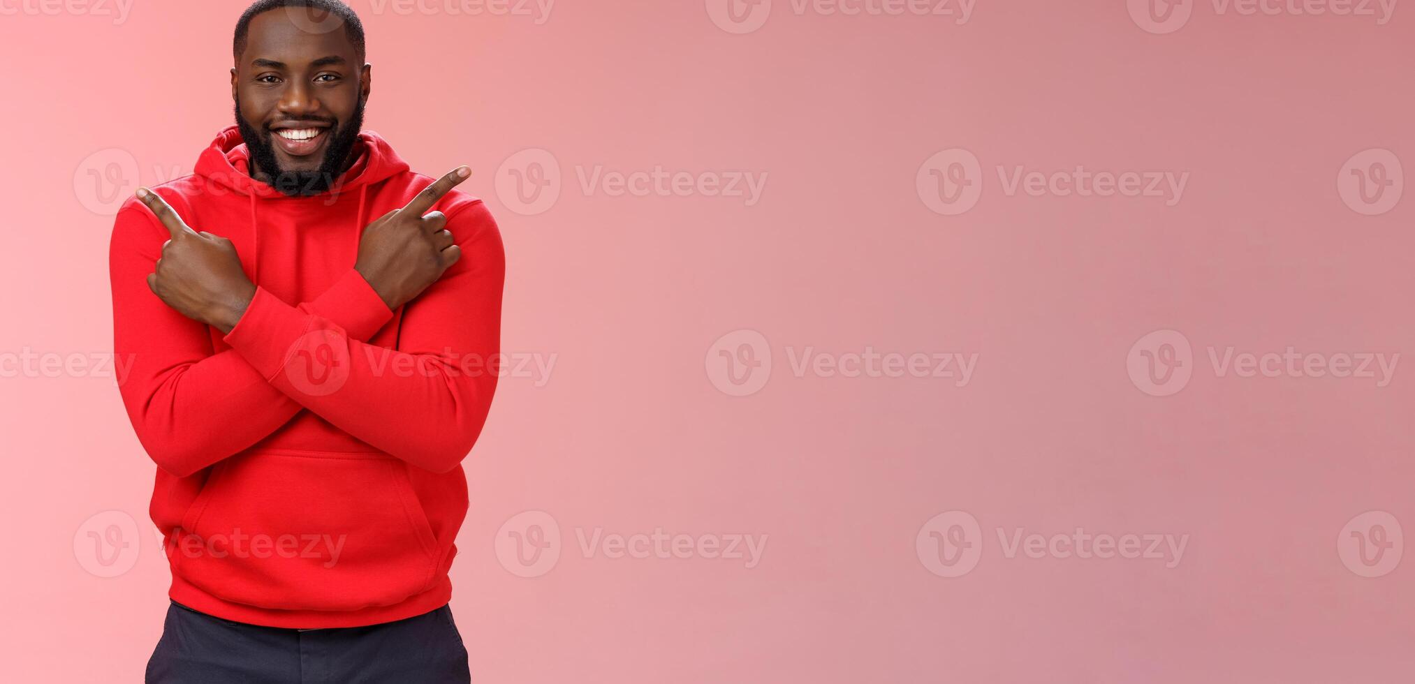 Happy handsome bearded boyfriend pointing different sides cross fingers left right smiling happily asking girlfriend opinion advice what choice make, proposing opportunities variety products photo