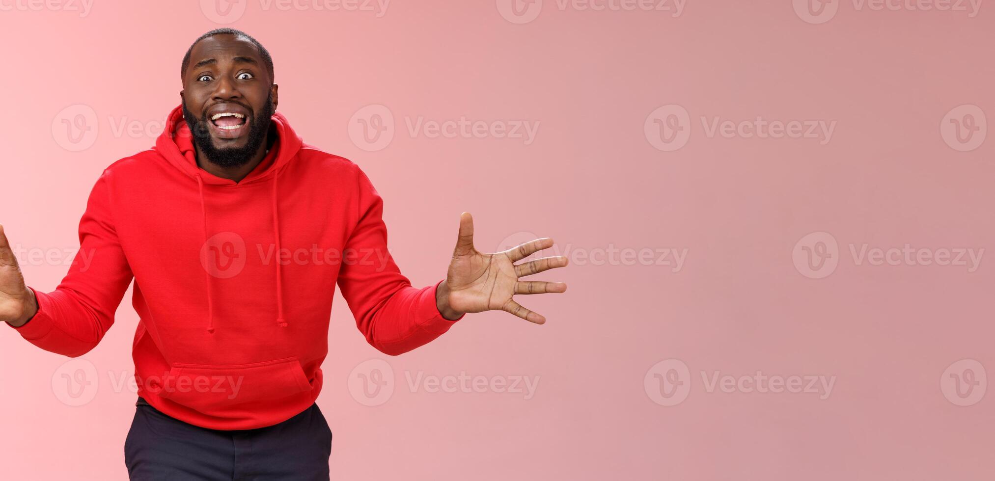 Please no not my games. Portrait shocked devastated panicking young bearded african american guy begging girlfriend not delete favorite app widen eyes yelling supplicating gesturing hands upset photo