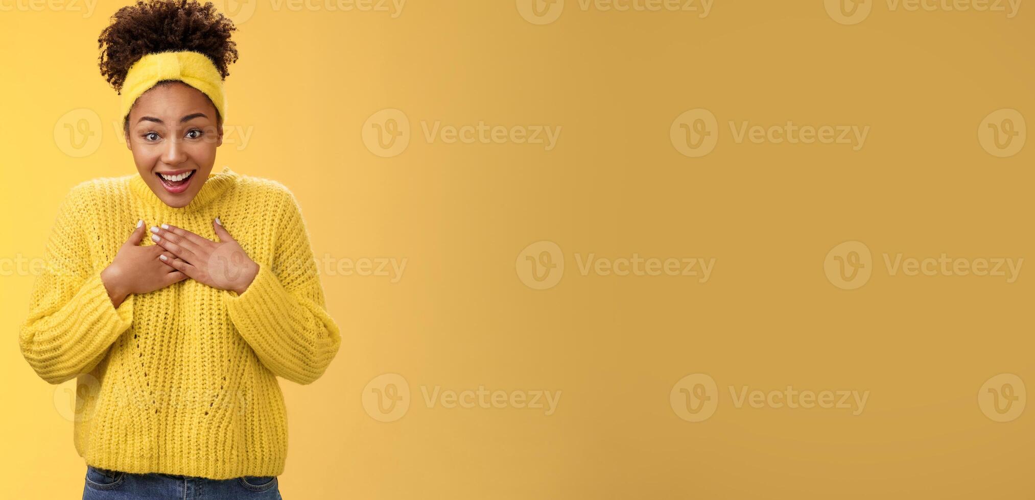 Glad impressed surprised cute african american girlfriend receive awesome unexpected surprised widen eyes open mouth amazed press palms chest is it for me gesture thankful, appreciate effort photo