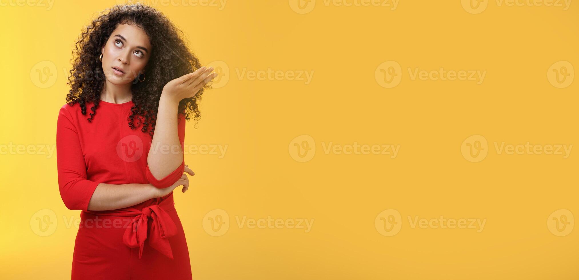 Girl being annoyed unwilling to listen boyfriend yell rolling eyes up from annoyance and irritation sighing bothered slapping forehead with palm fed up and disappointed over yellow background photo