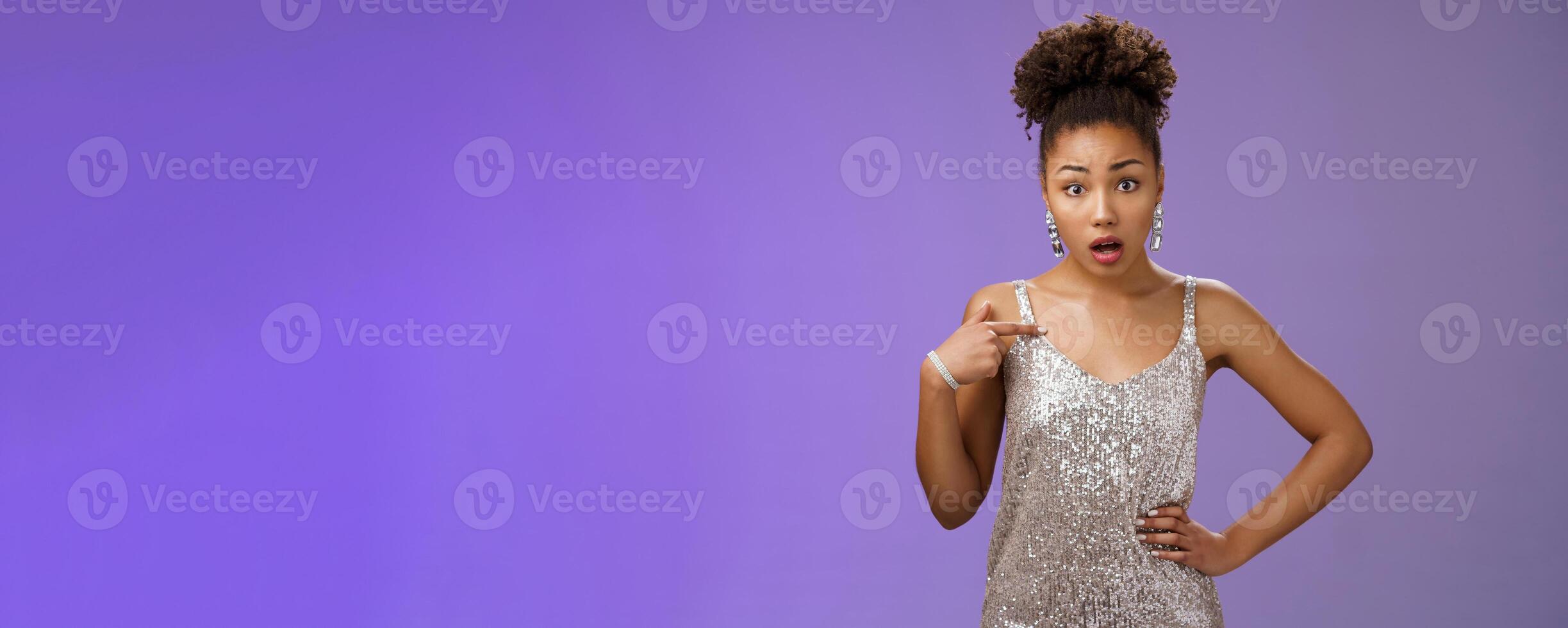 Insulted shocked concerned african-american woman complaining look offended pointing herself frustrated questioned look camera talking you standing shocked worried pose blue background photo