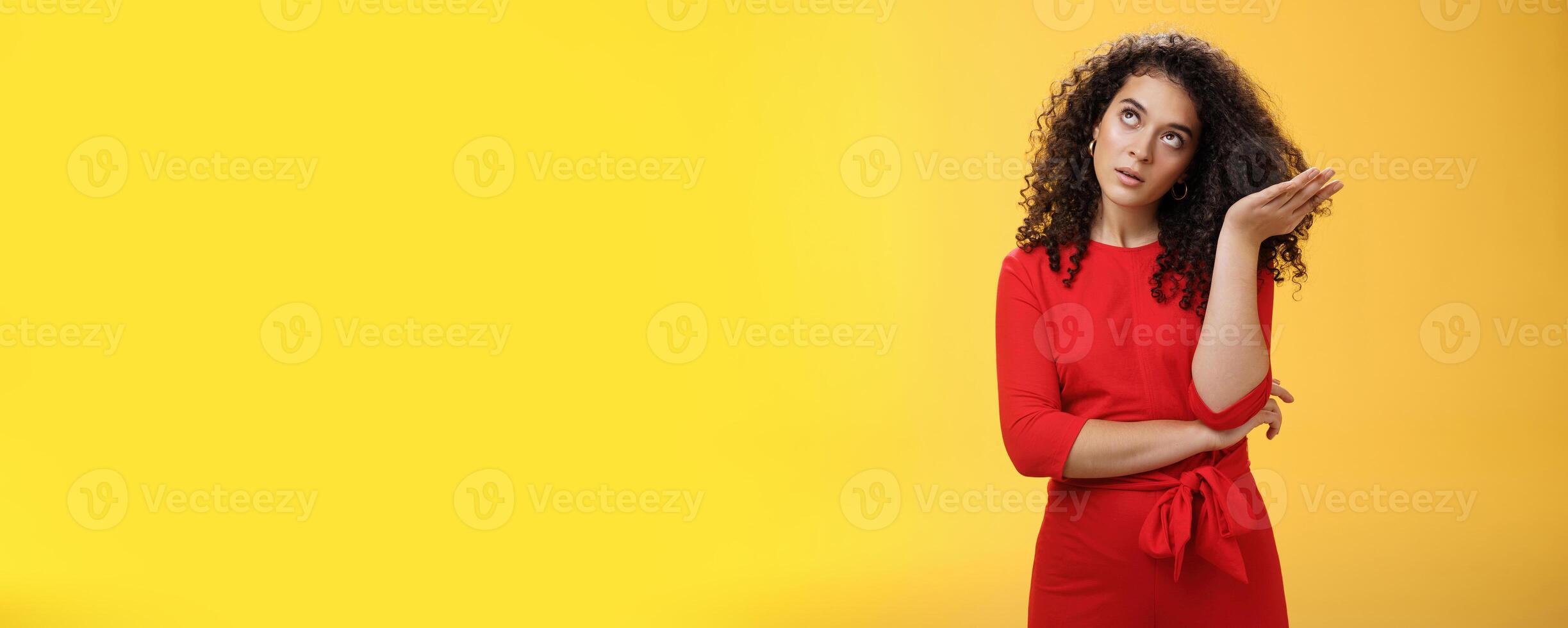 Girl being annoyed unwilling to listen boyfriend yell rolling eyes up from annoyance and irritation sighing bothered slapping forehead with palm fed up and disappointed over yellow background photo