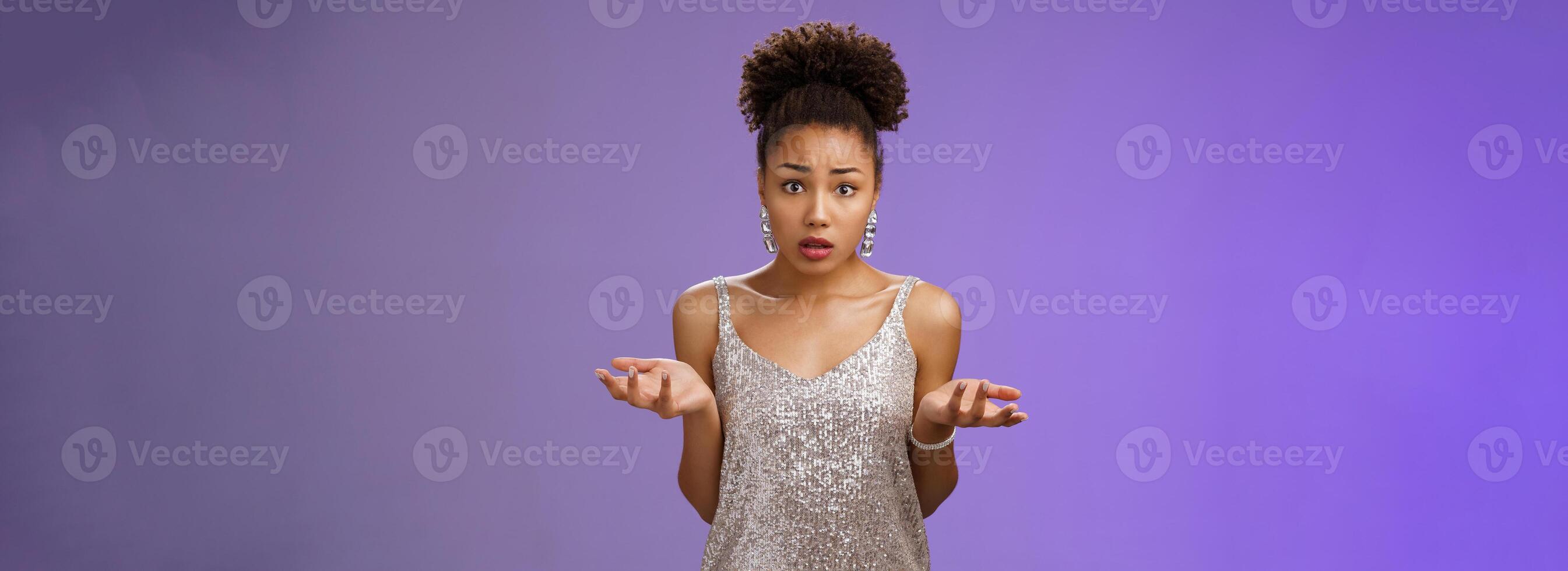 Concerned frustrated and confused attractive african-american curly-haired girl cannot understant what happening raise hands clueless dismay look questioned silly asking what did wrong photo