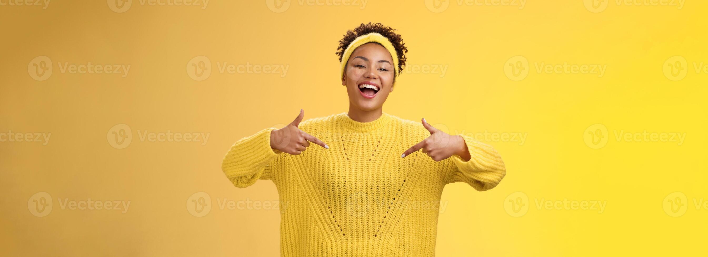Confident good-looking outgoing black cute girl 20s in sweater headband afro hairstyle pointing heself raise head arrogant laughing bragging telling own personal goals achievements, suggest herself photo