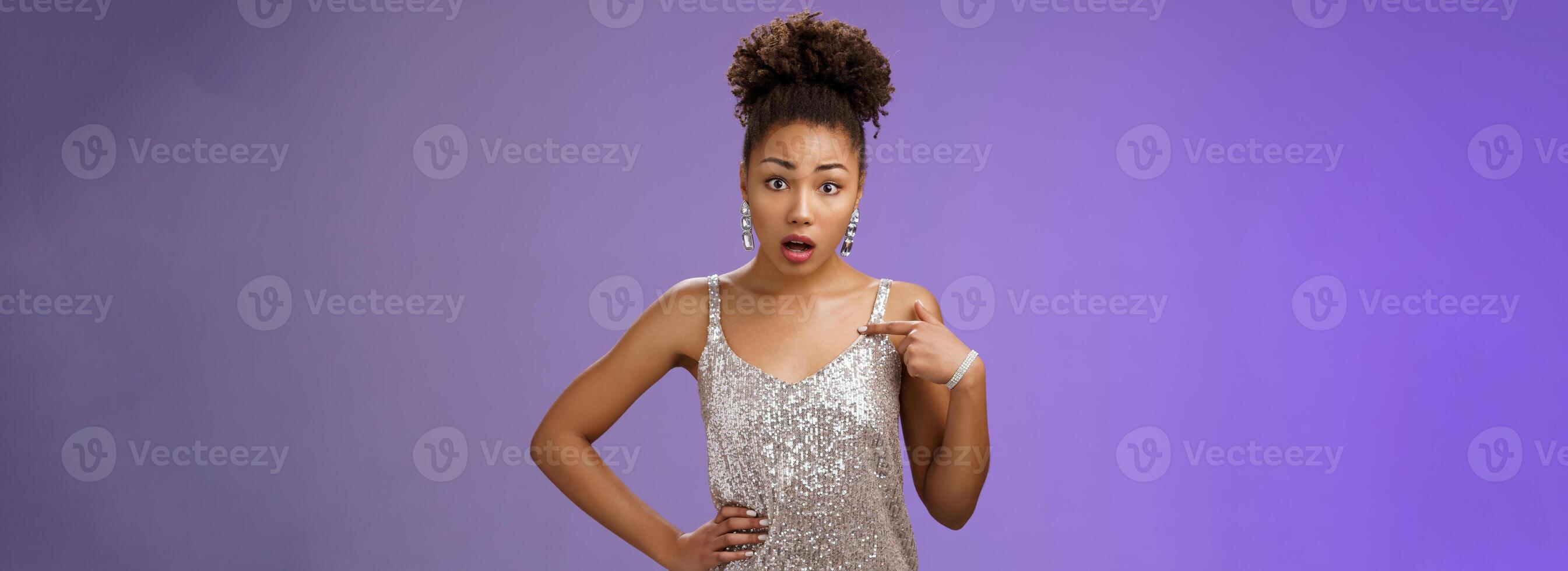 Insulted shocked concerned african-american woman complaining look offended pointing herself frustrated questioned look camera talking you standing shocked worried pose blue background photo