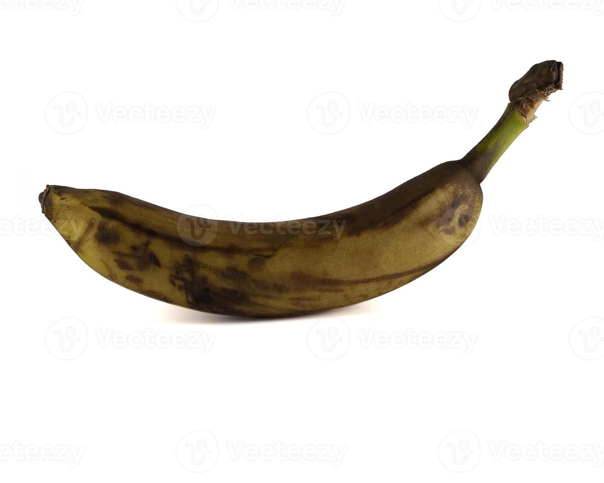 Yellow rotten banana isolated on a white background photo