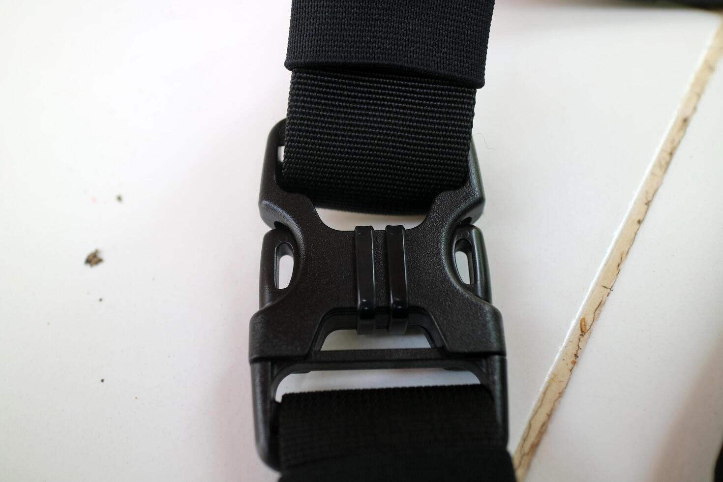 a large black strap lock bag photo