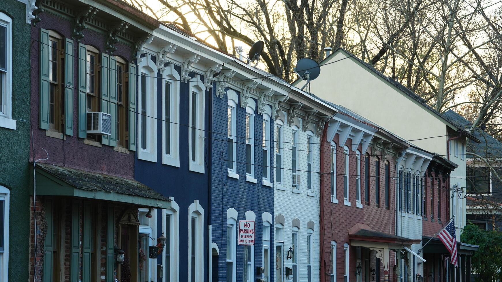 The beautiful little town landscape with the colorful autumn leaves and old buildings in USA photo