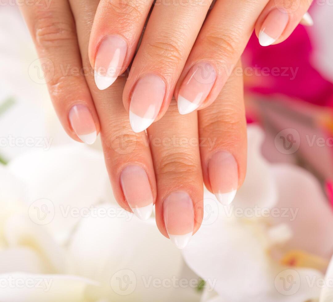 Beautiful woman's nails, french manicure. photo