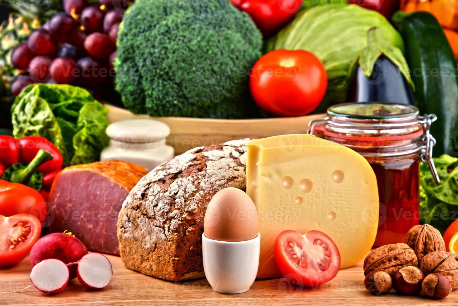 Organic food including vegetables fruit bread dairy and meat photo