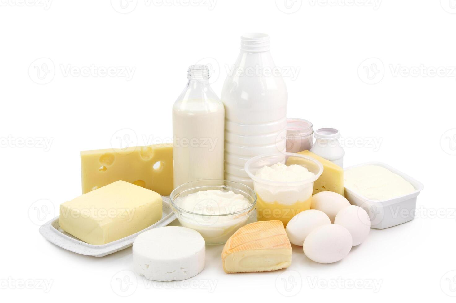 Dairy products and eggs isolated on white background photo