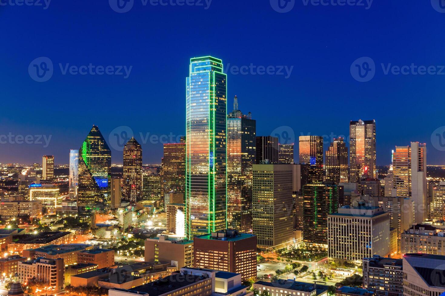 Dallas, Texas cityscape with blue sky at sunset photo