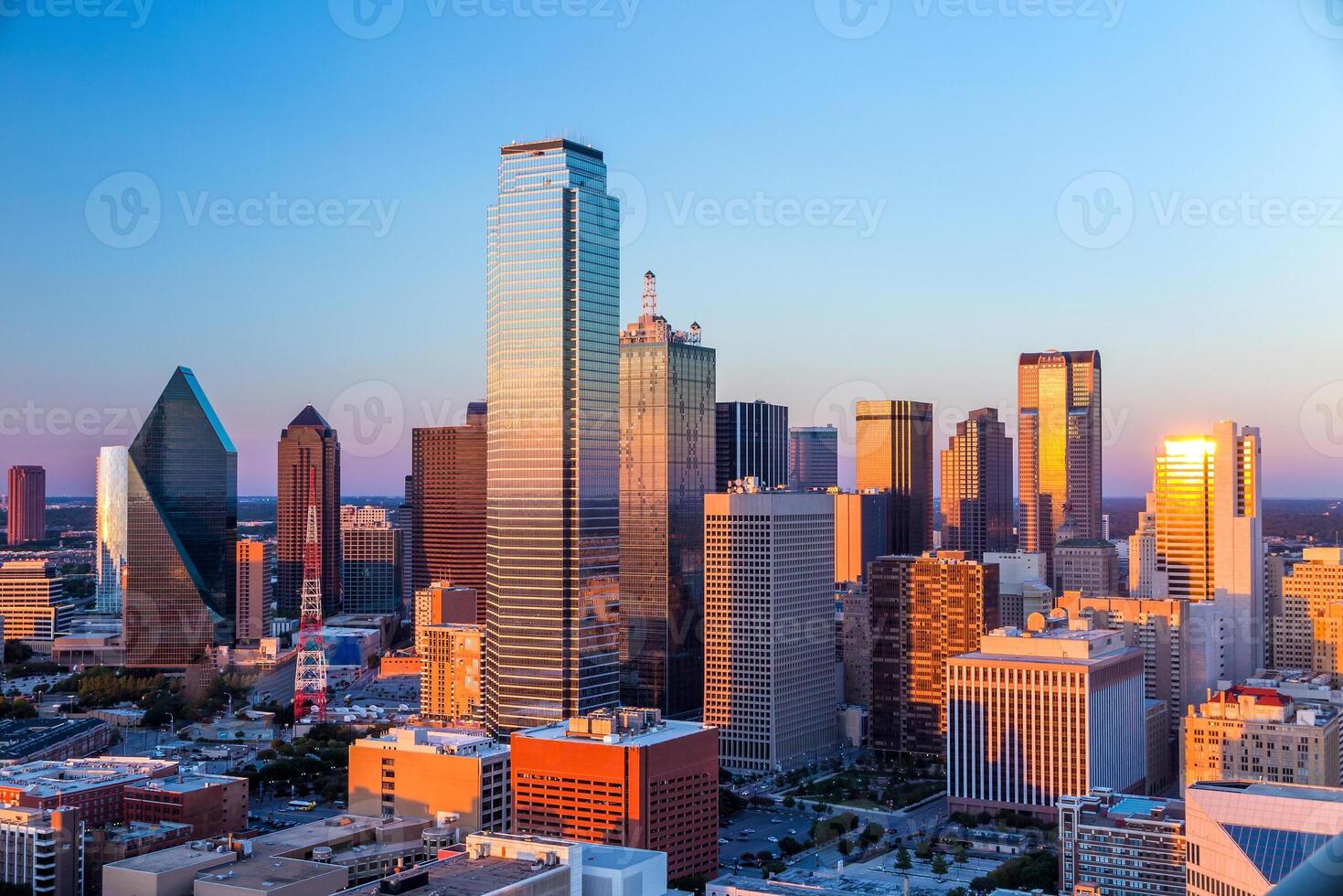 Dallas, Texas cityscape with blue sky at sunset photo