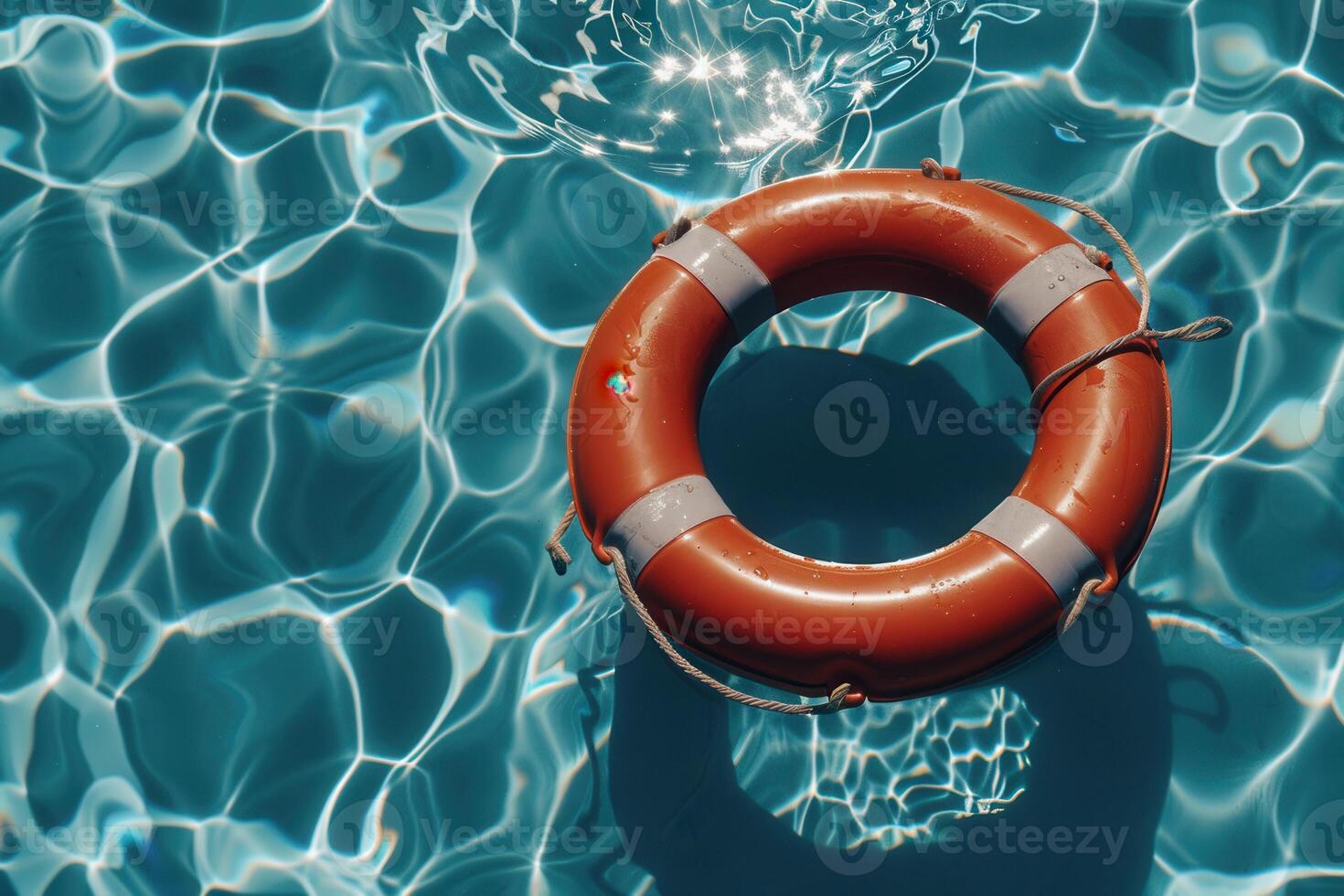 Essential Life Buoy Floating in the Pool, Providing Crucial Water Safety and Emergency Rescue Support photo