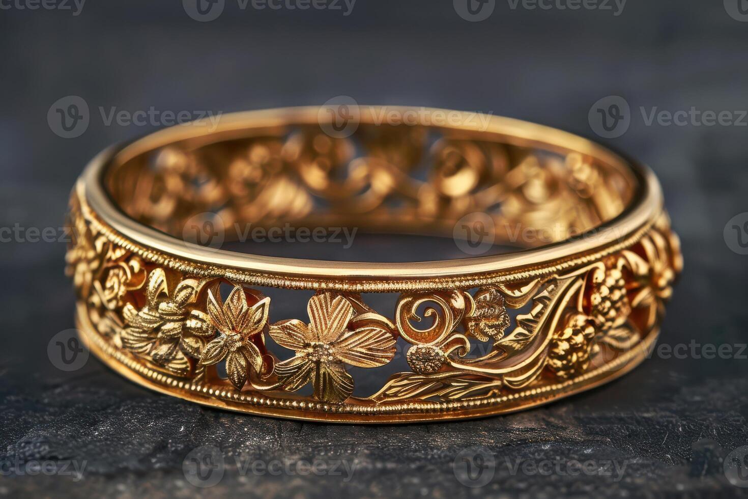 Exquisite Gold Bracelet Featuring Detailed and Elegant Designs photo