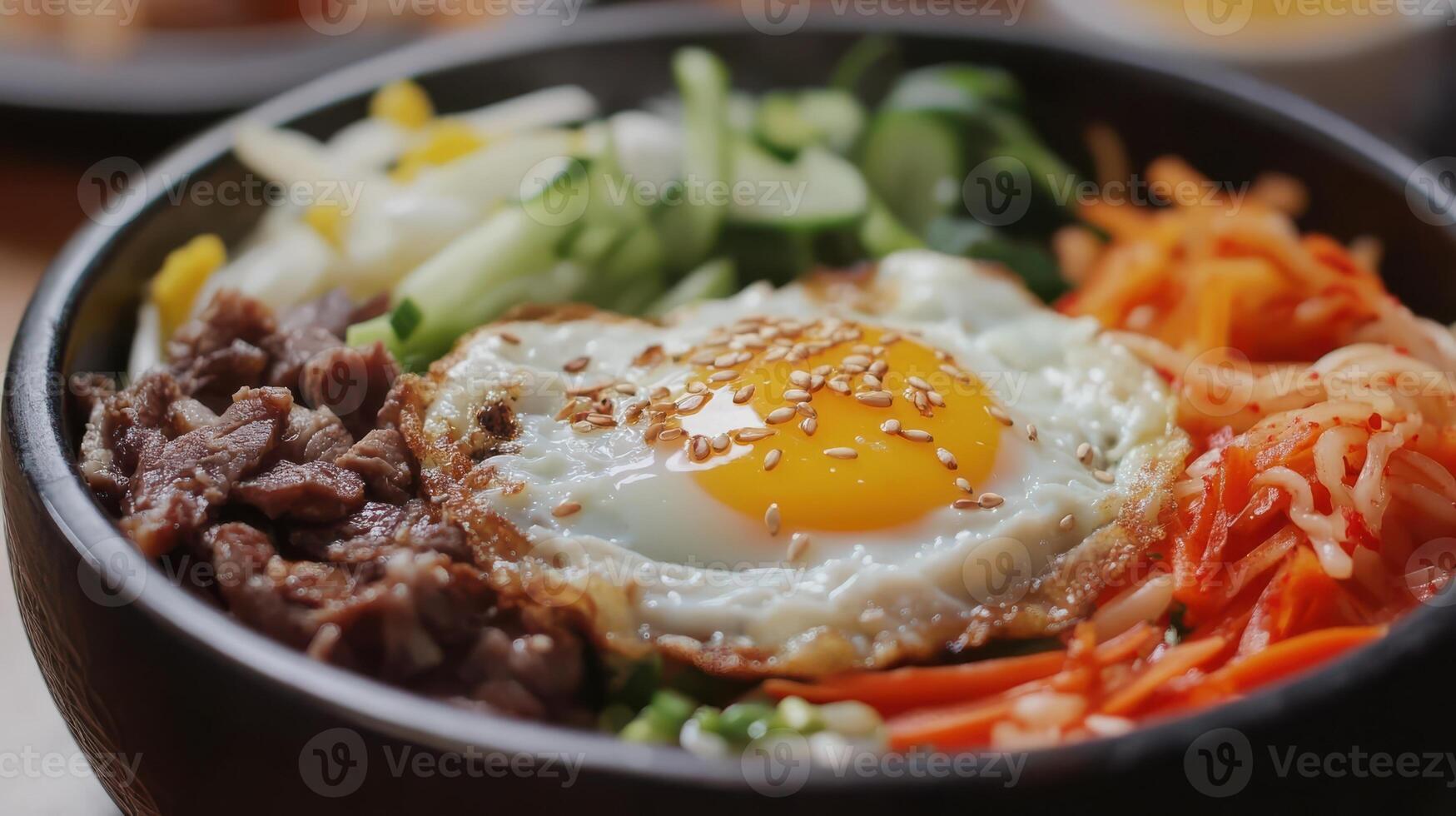 Bibimbap with Fried Egg, Meat, and a Mix of Vegetables photo