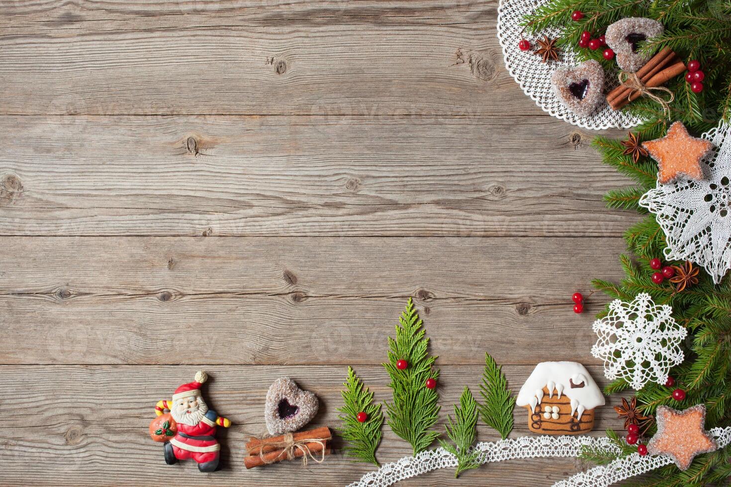 Christmas wooden background with ornaments photo