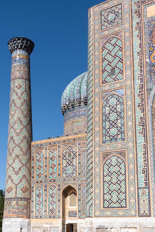 Samarkand, Uzbekistan-august 12, 2023-Particular of the Registan square during a sunny day photo