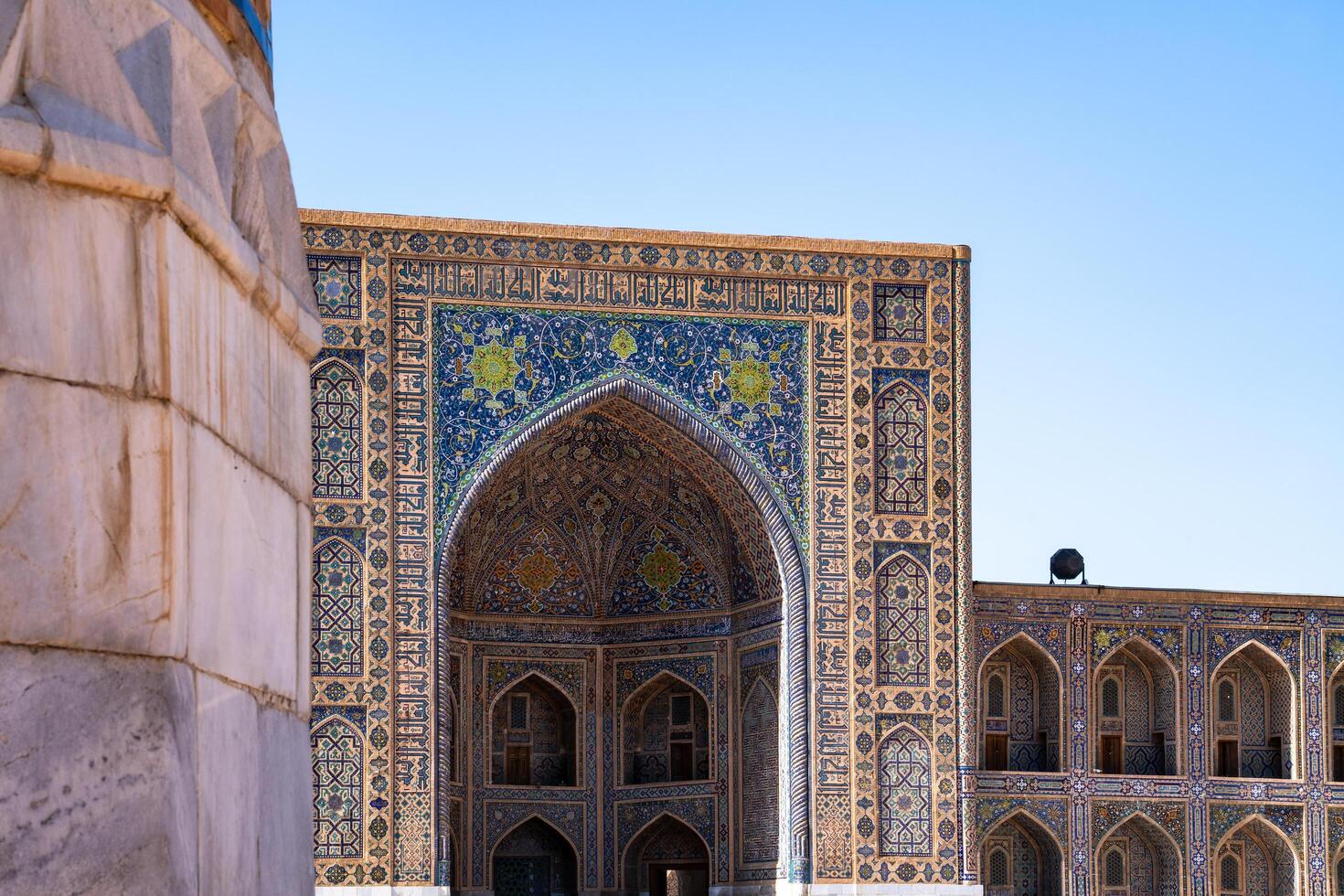 Samarkand, Uzbekistan-august 12, 2023-Particular of the Registan square during a sunny day photo