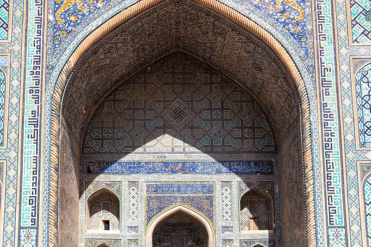Samarkand, Uzbekistan-august 12, 2023-Particular of the Registan square during a sunny day photo