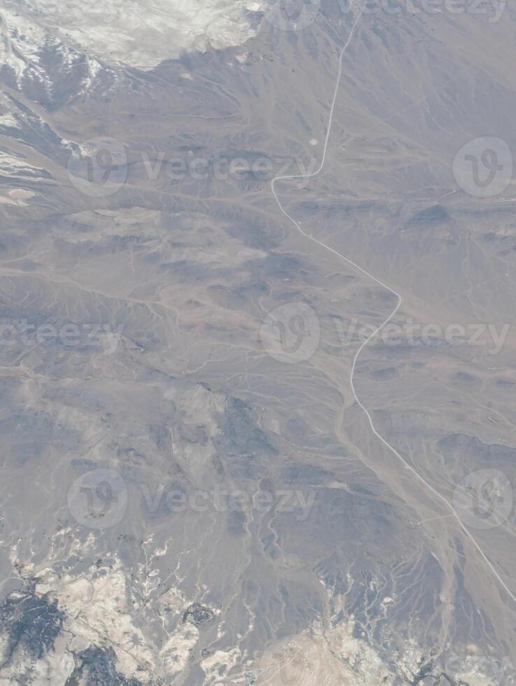 Airplane view. Mojave Desert. Small towns, roads and fields. Scenic view from above on the ground photo