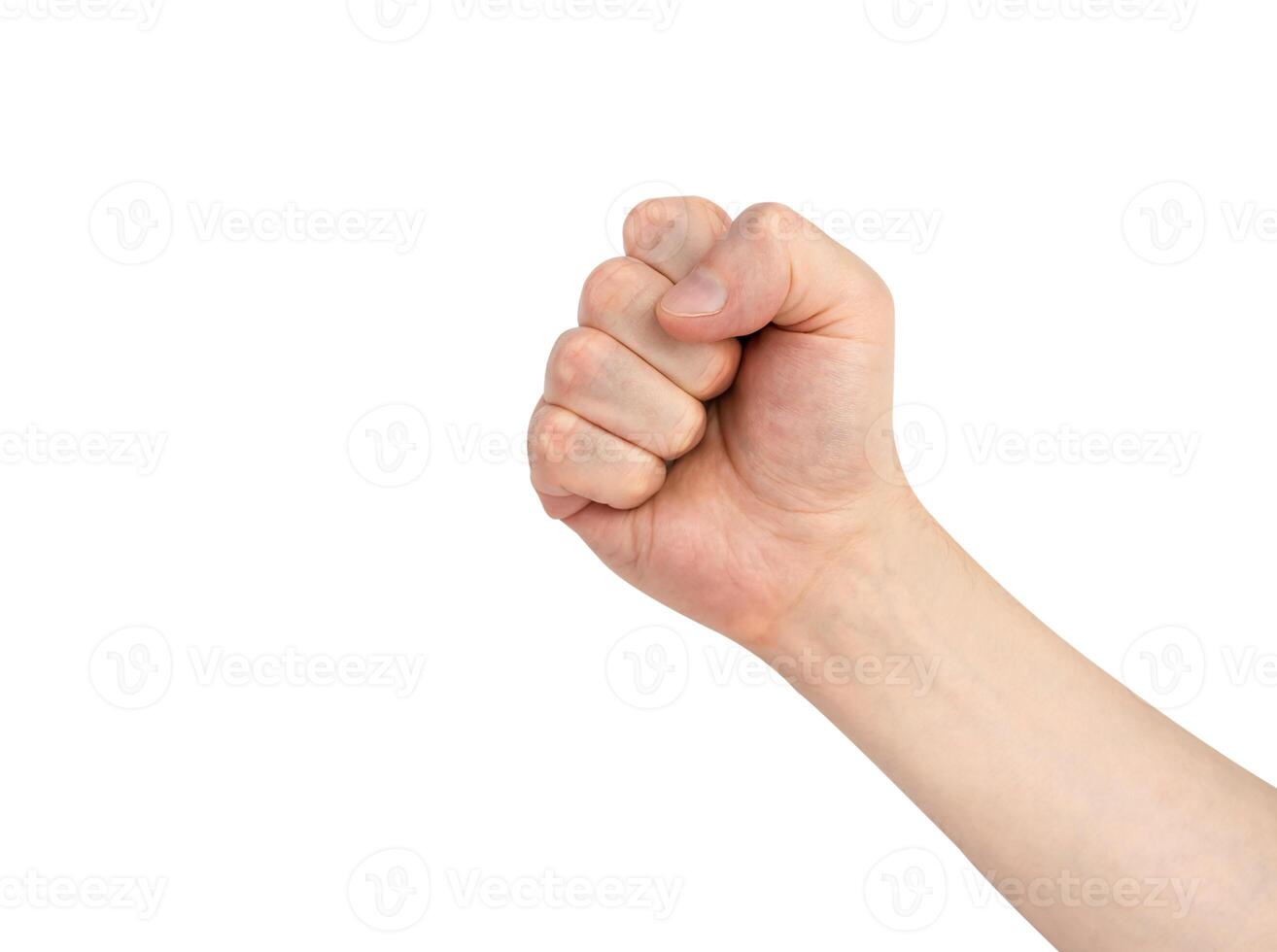 A man's hand shows a fist isolated on white background. Close-up. photo