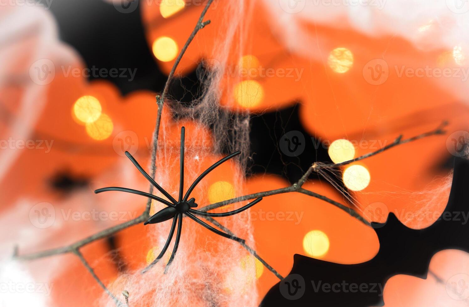 Festive decor for Halloween with spiders, bats and cobwebs. Close-up. Selective focus. photo