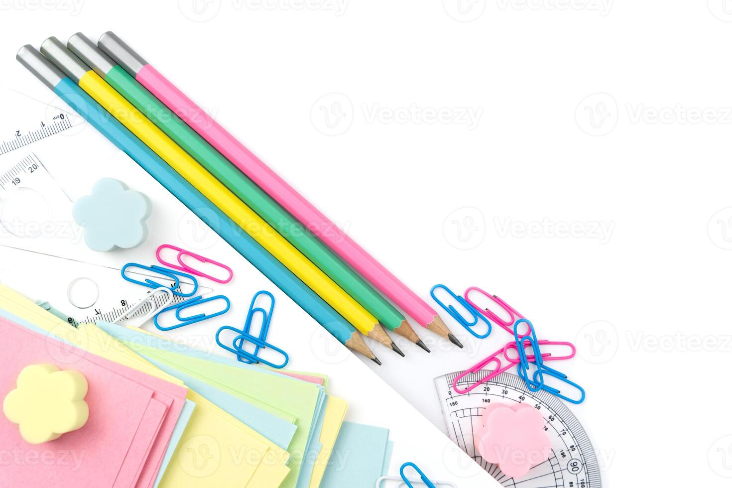 School colorful stationery on the white table. Copy space. Selective focus. photo