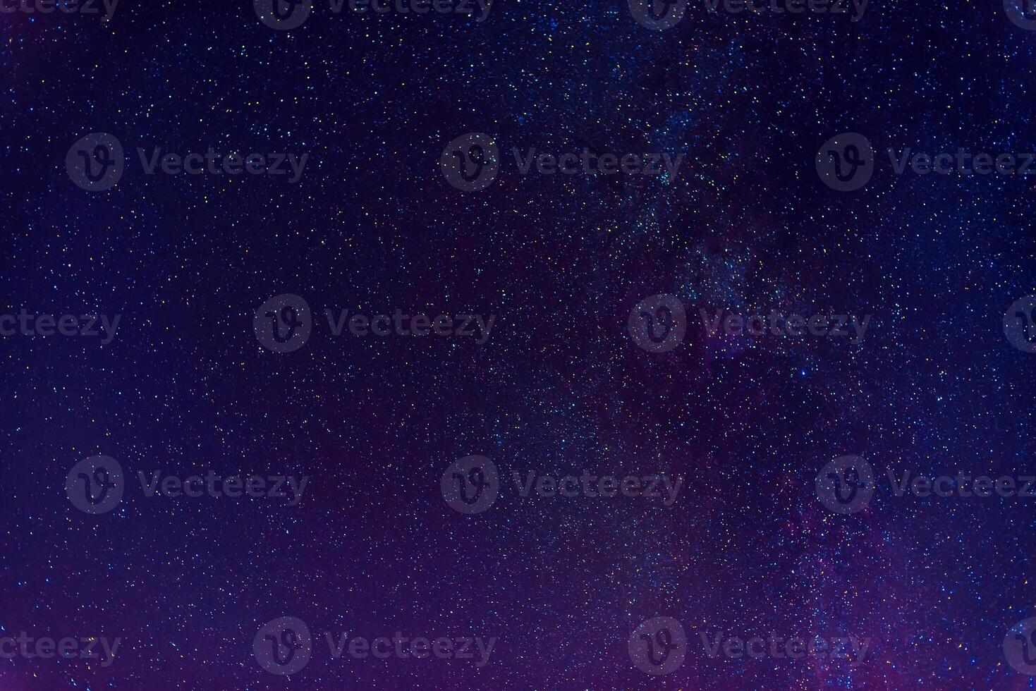 Astrophotography of dark blue starry sky with many stars, nebulae and galaxies photo