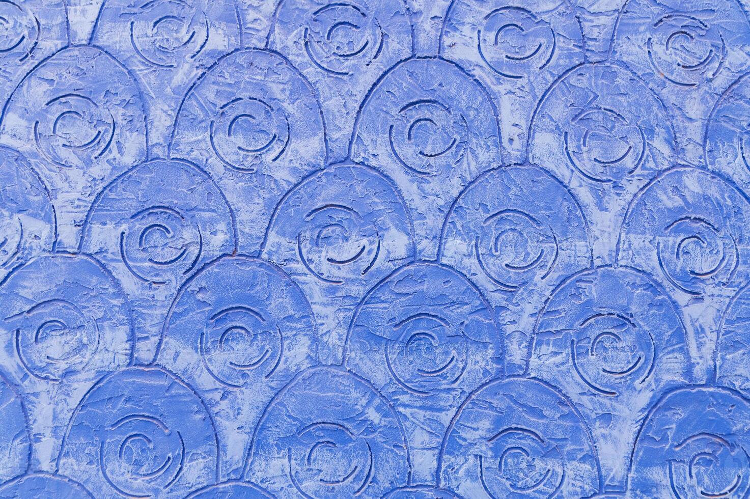 Background of blue plaster with a pattern photo