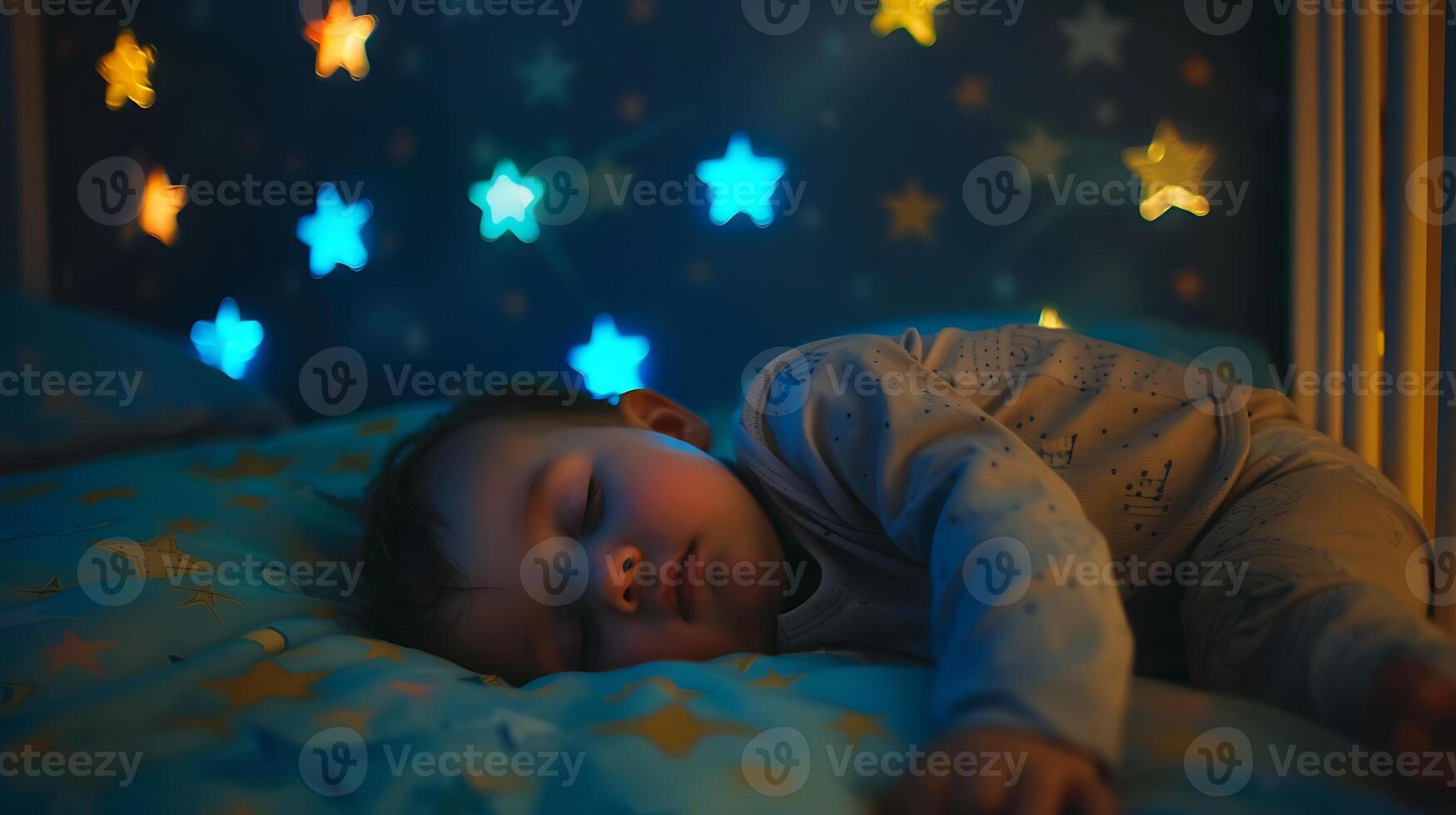 A baby sleeps soundly in a crib, surrounded by star-shaped nightlights. photo