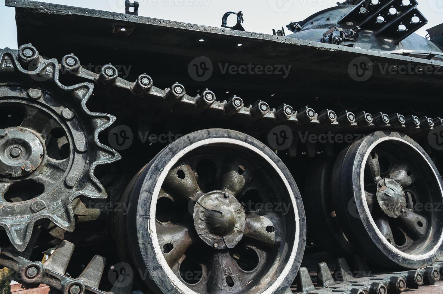 metal old caterpillar track of military army metal Soviet tank in close up photo