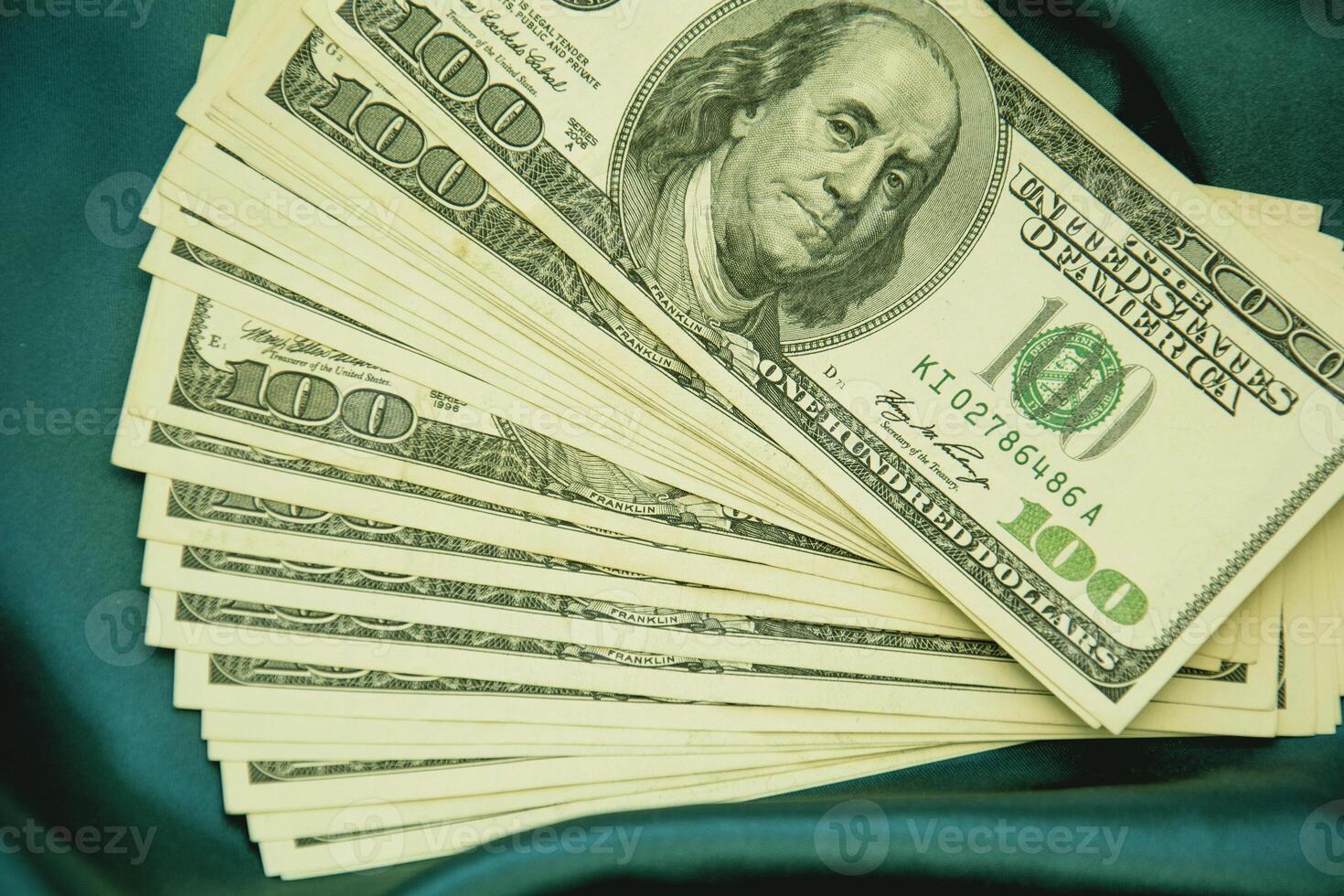 Lots of dollars on a beautiful background in a photo studio