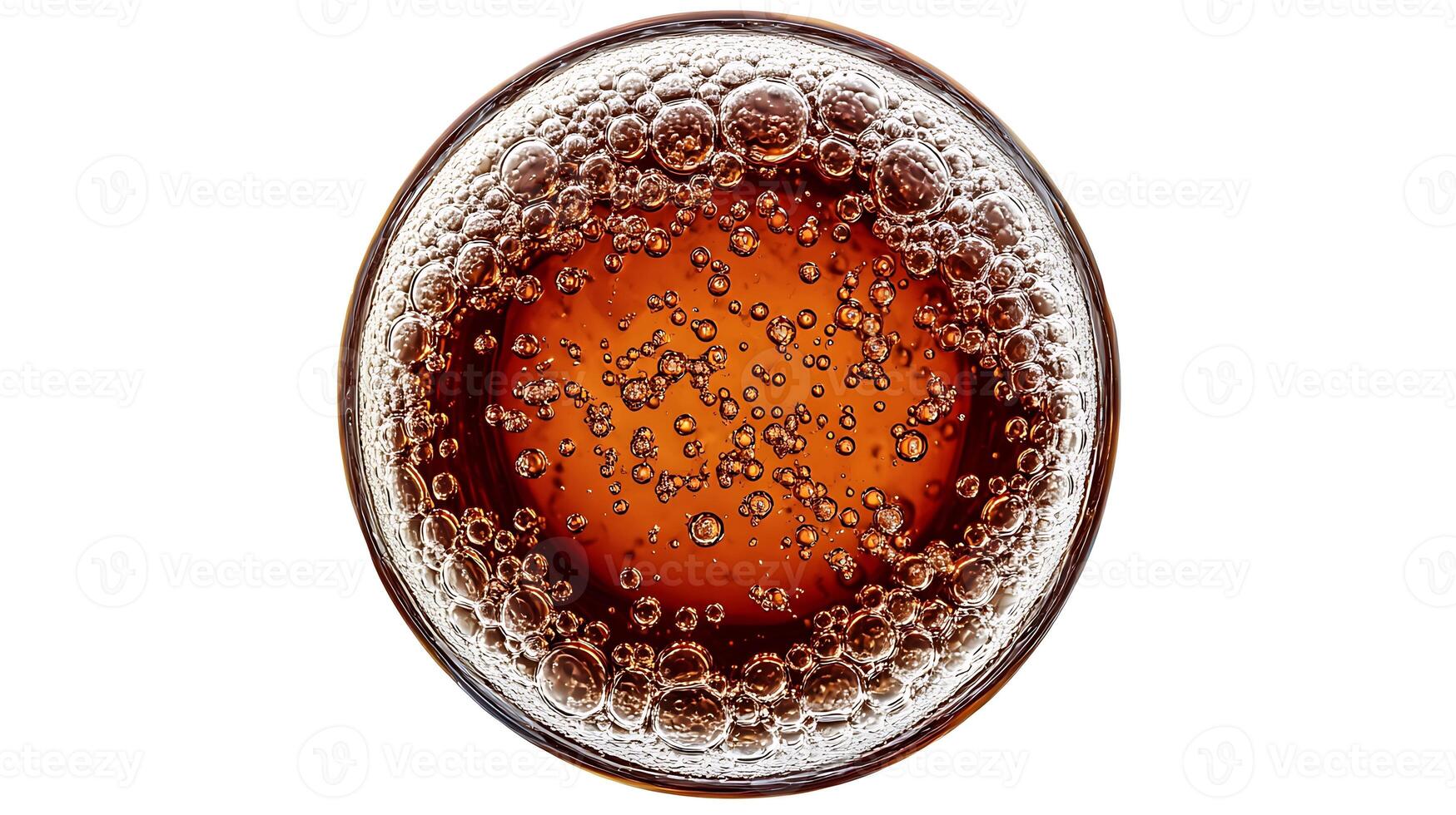Top view of a glass of dark liquid with bubbles. photo