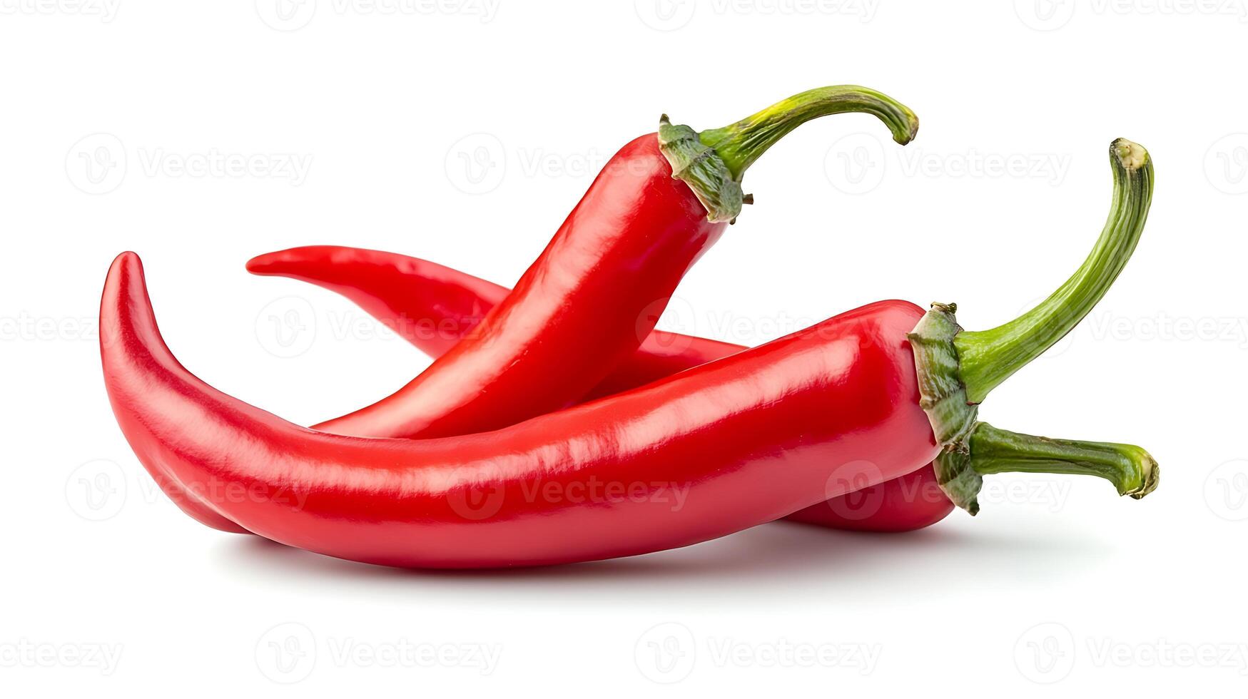 Two red chili peppers with green stems isolated on white background. photo